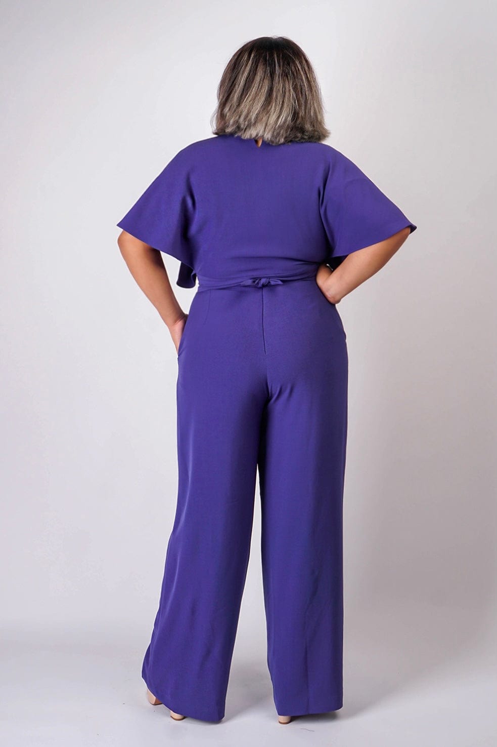 DCD JUMPSUITS & ROMPERS Blue Bonnet Pleated Wrap Necee Jumpsuit