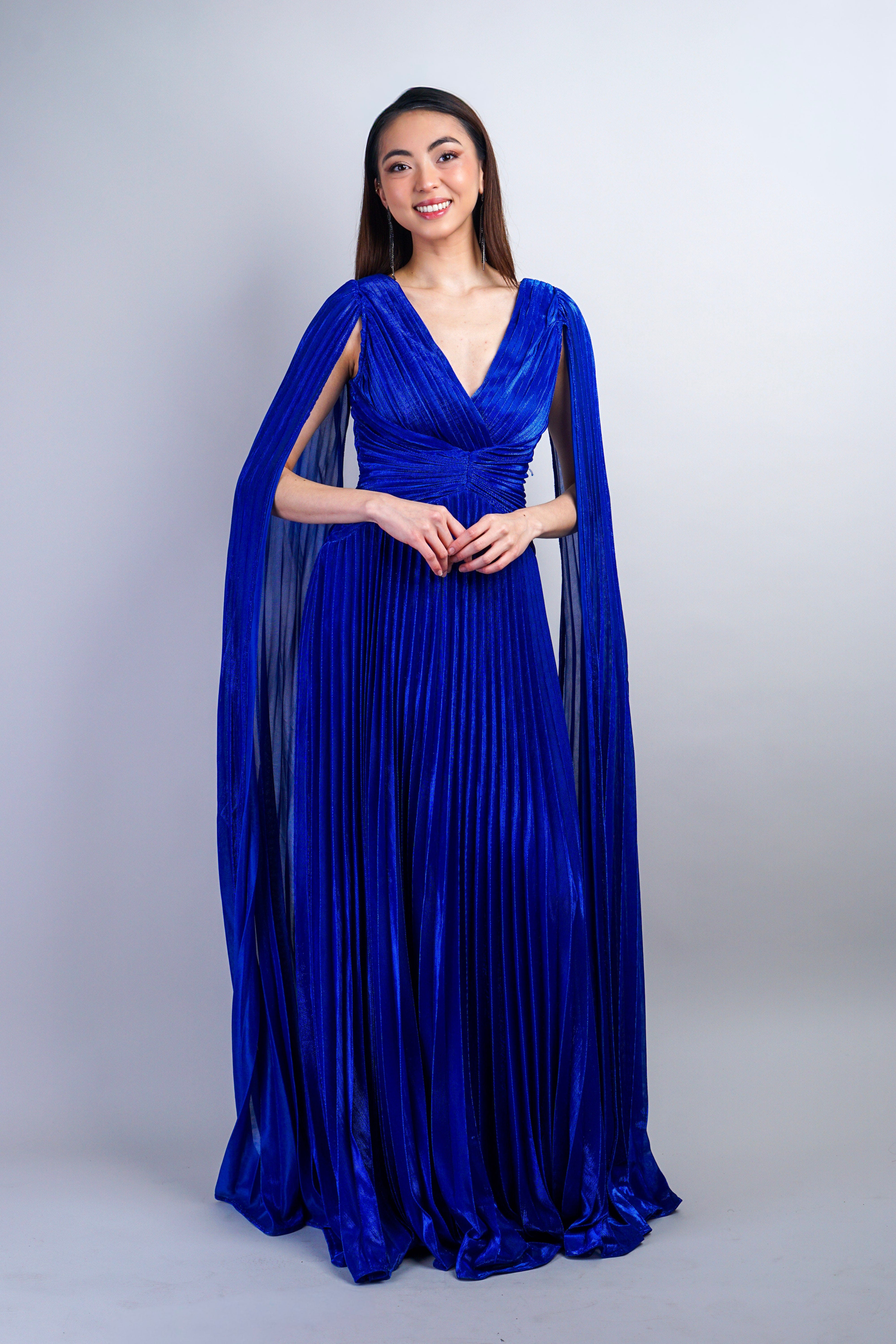 Royal Blue V-Neck Cape Pleated Gown | Women's Clothing and Accessories | Houston, TX Royal Blue V-Neck Cape Pleated Gown | Women's Clothing and Accessories | Houston, TX